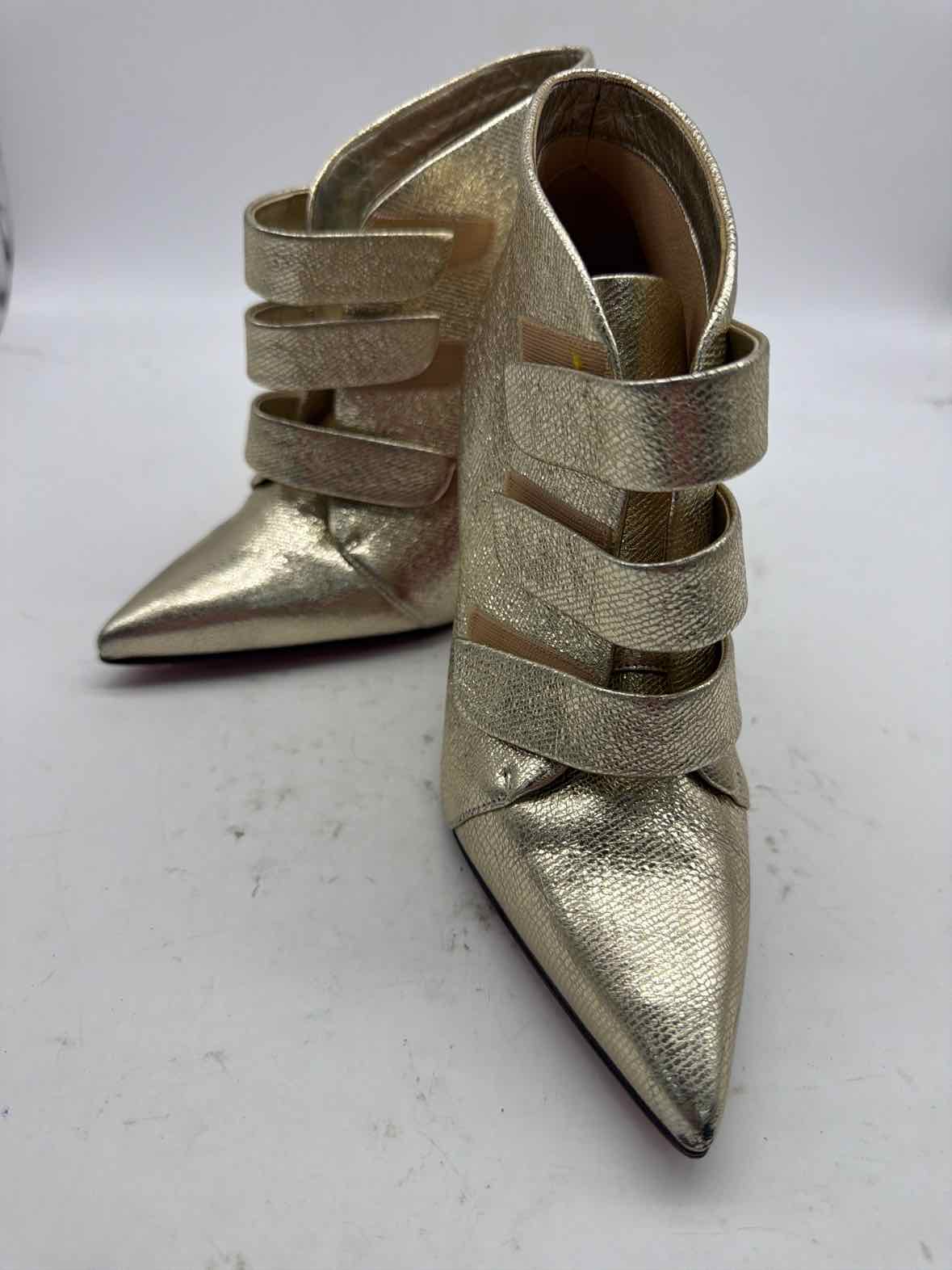 Pre-Owned Christian Louboutin Gold Size 6.5 Ankle Boot Boots | True Fashionistas.