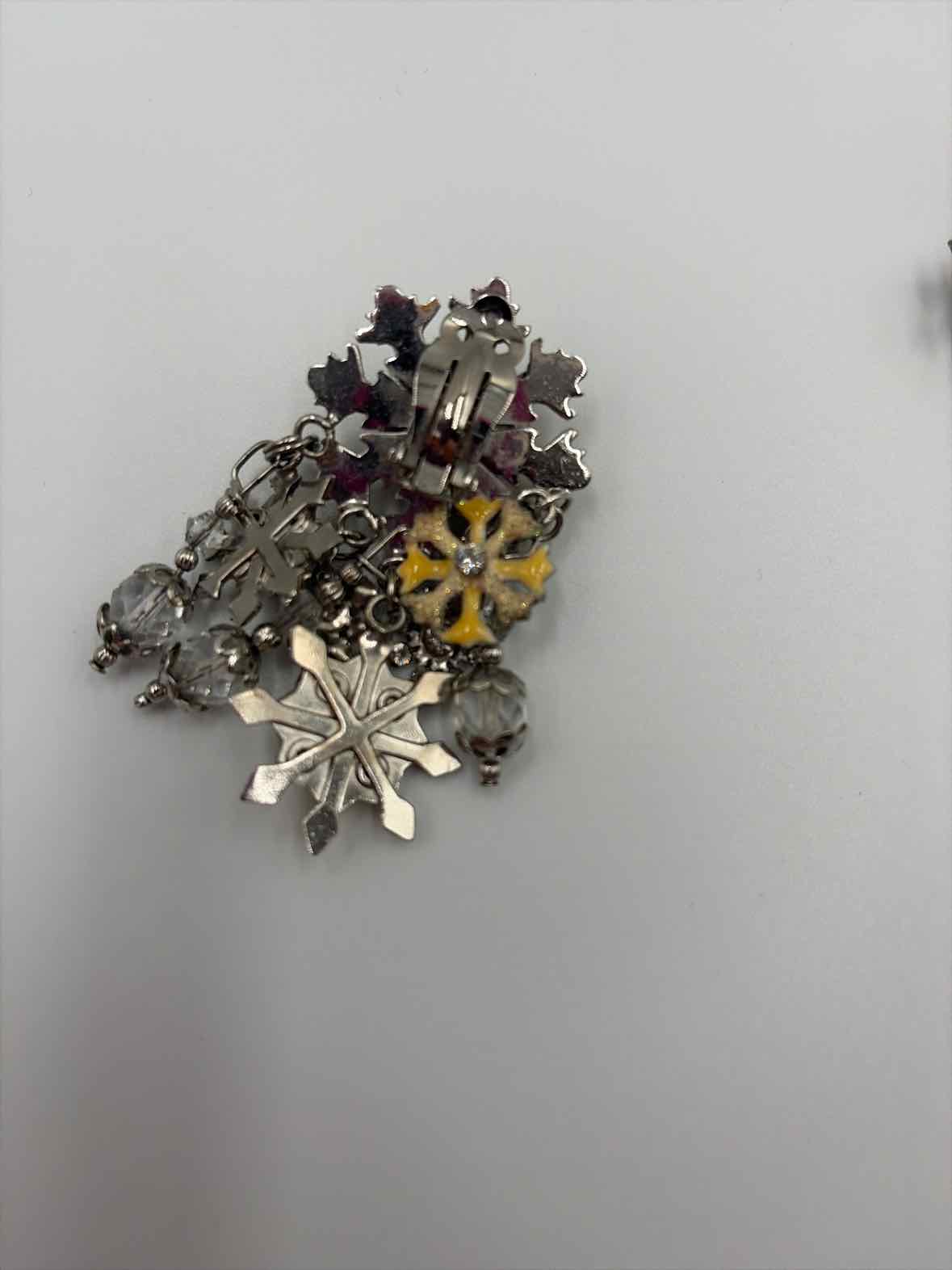Lunch At The Ritz Silver clip Drop Earrings | True Fashionistas.