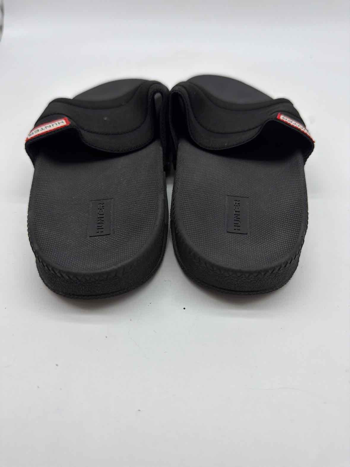 Pre-Owned Hunter Black Size 9 Slide Heels | True Fashionistas.