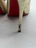 Pre-Owned Christian Louboutin Gold Size 6.5 Ankle Boot Boots | True Fashionistas.