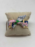 Lilly Pulitzer Gold and White Printed Fabric Bracelet | True Fashionistas.