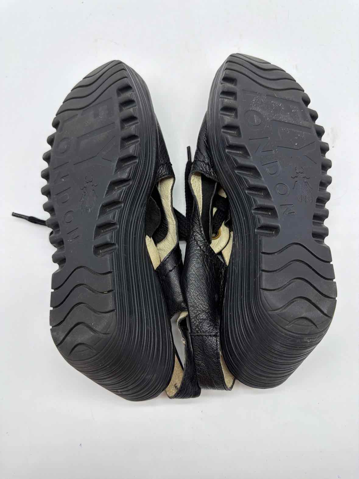 Pre-Owned Fly London Black Size 40 Wedge Heels | True Fashionistas.
