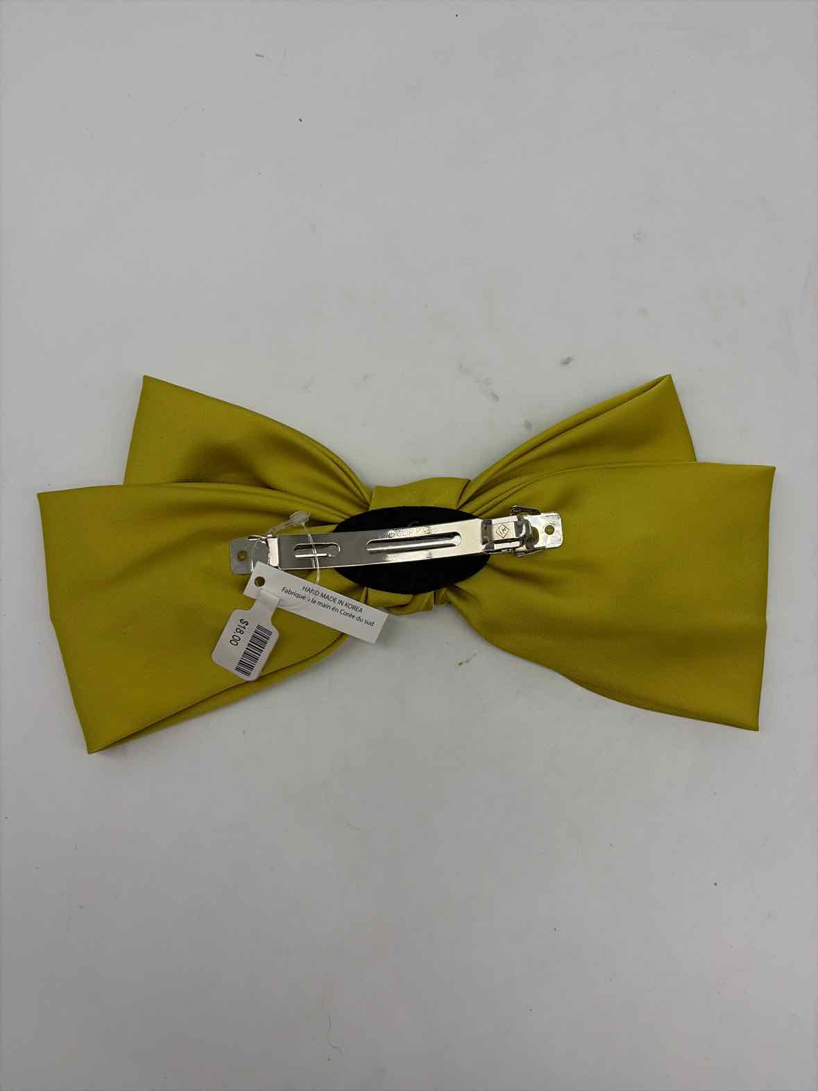 Pre-Owned Yellow Hair Accessory | True Fashionistas.