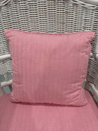 White Wicker Chair With Pink Cushions | True Fashionistas.