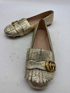 Pre-Owned Gucci Gold Size 6 GG Marmot Fringe Flat Flats | True Fashionistas.